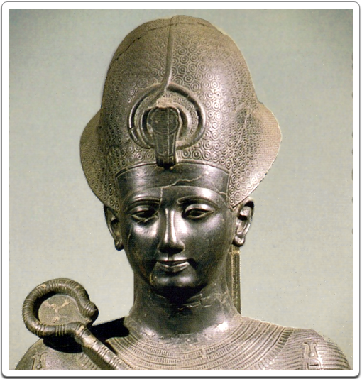Head of a statue of Ramesses II, wearing the blue crown.